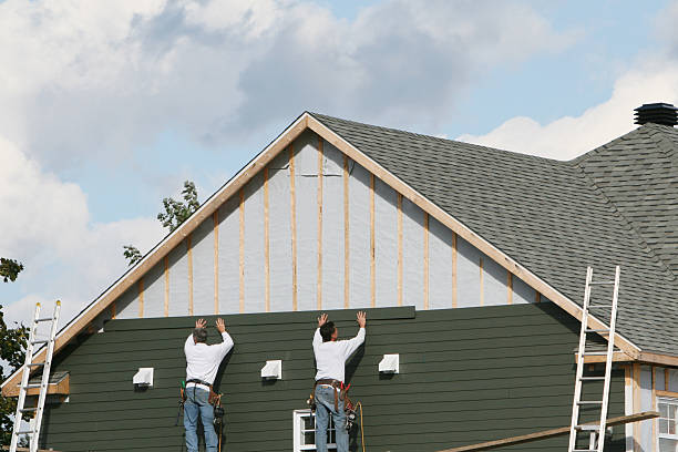 Professional Emergency Siding Repair technician working in North Royalton, OH